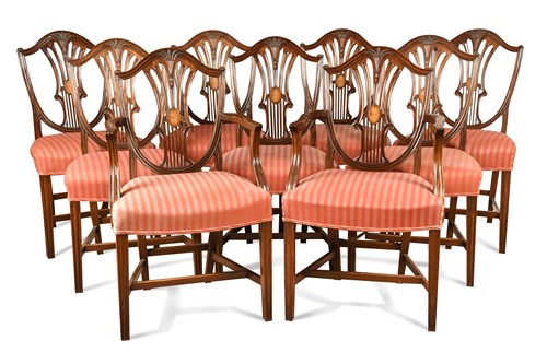 Lot 417 - A set of twelve mahogany shield back dining chairs, 19th century