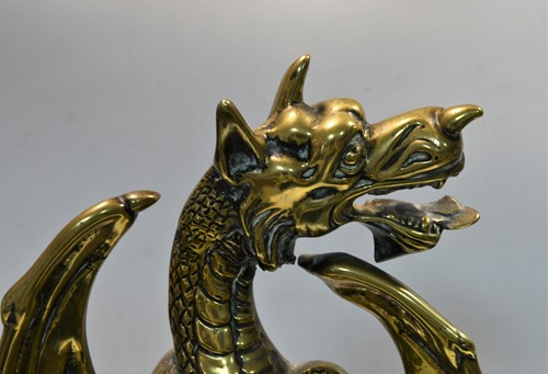 Lot 382 - A brass dragon door stop