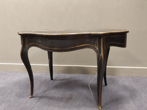 Lot 729 - A 19th century ebonised shaped oval table, 76...