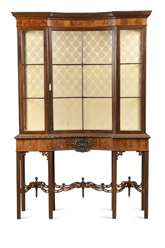 Lot 609 - A mahogany display cabinet with concave central door, early 20th century