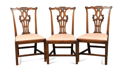 Lot 408 - A set of three fruitwood dining chairs, 18th century