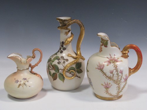 Lot 1 - A Royal Worcester jug, with a lizard handle,...