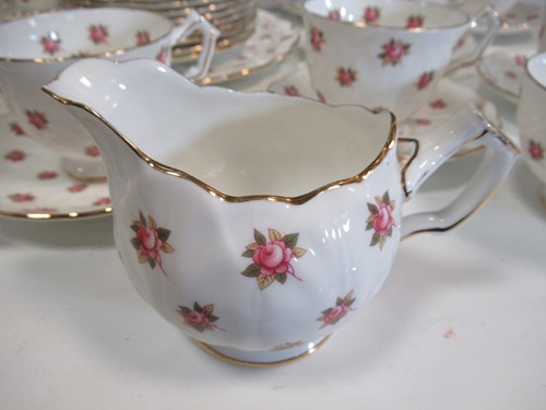Lot 65 - An Aynsley Rosedale pattern tea service...