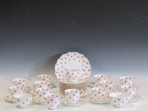 Lot 65 - An Aynsley Rosedale pattern tea service...