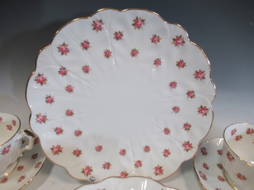 Lot 65 - An Aynsley Rosedale pattern tea service...