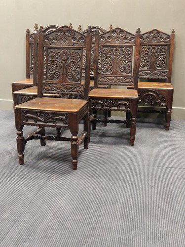 Lot 694 - Six carved oak dining chairs all stamped to...