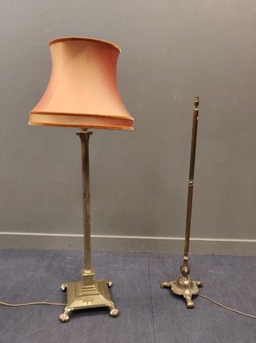 Lot 754 - Two brass standard lamps, with shades, without...