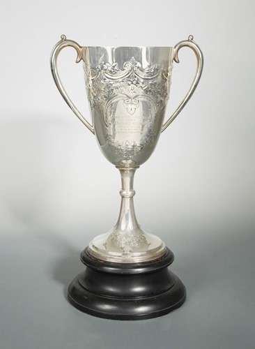 Lot 527 - An impressive Victorian silver two handled trophy cup and stand