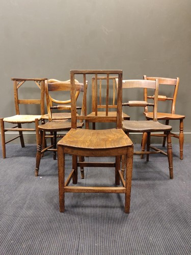 Lot 740 - A set of three knife back kitchen chairs...