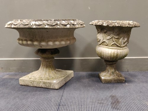 Lot 768 - Two composite garden urns, one with a...