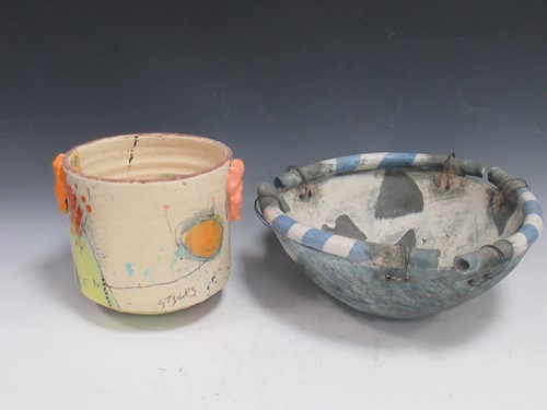 Lot 26 - A studio pottery hanging bow; together with...
