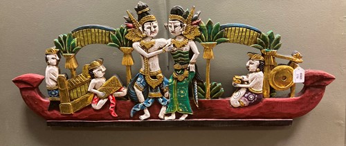 Lot 779 - A South East Asian painted wood carving of a...