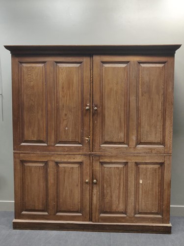 Lot 728 - An early 20th century estate made oak panelled...