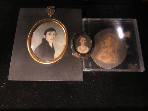 Lot 478 - Three portrait miniatures, two portraits of...