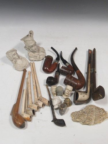 Lot 105 - A large collection of clay and wooden pipes...