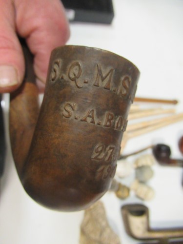 Lot 105 - A large collection of clay and wooden pipes...