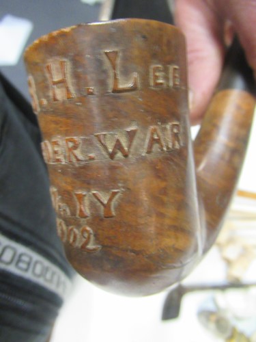 Lot 105 - A large collection of clay and wooden pipes...