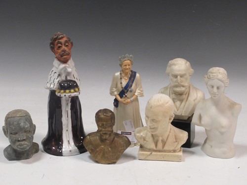 Lot 21 - A collection of busts and small statues,...