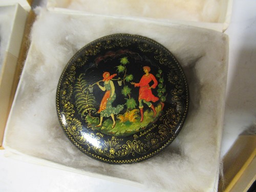 Lot 119 - Five Russian painted lacquer Palekh boxes- The...