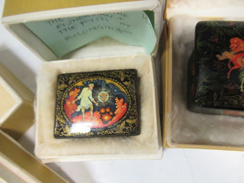 Lot 119 - Five Russian painted lacquer Palekh boxes- The...