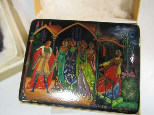 Lot 119 - Five Russian painted lacquer Palekh boxes- The...