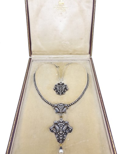 Lot 232 - Carlo Giuliano - A diamond and pearl necklace and brooch en suite