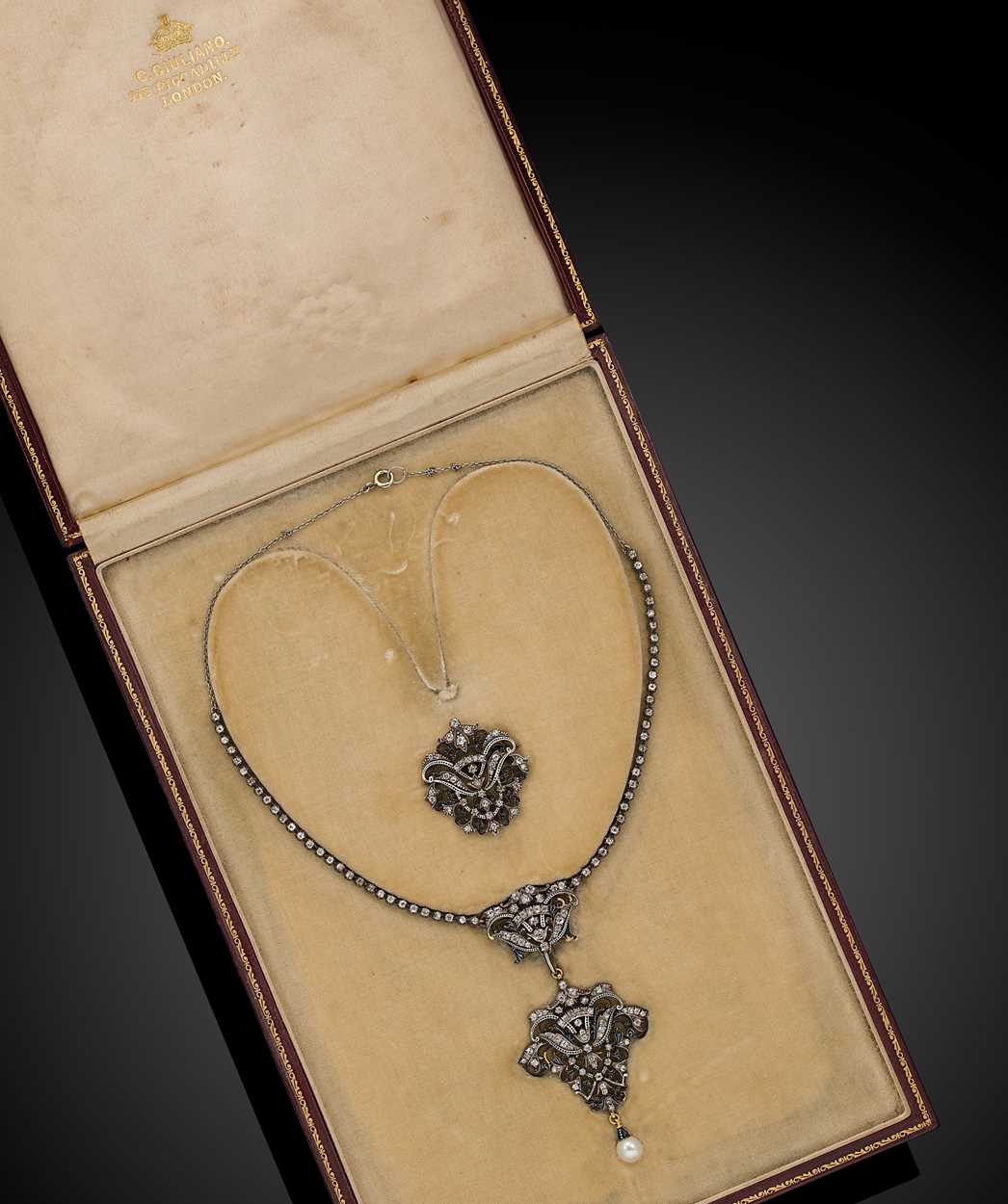 Lot 232 - Carlo Giuliano - A diamond and pearl necklace and brooch en suite
