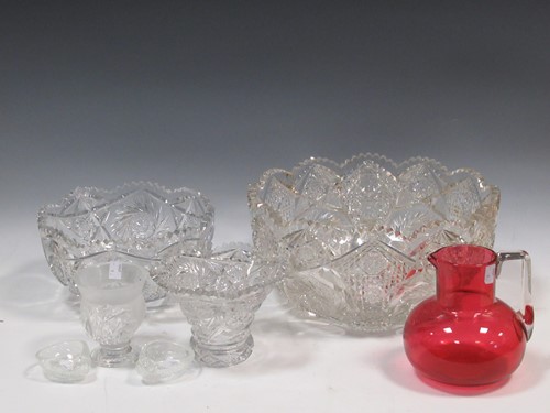 Lot 10 - A massive cut glass Punch bowl, A similar...