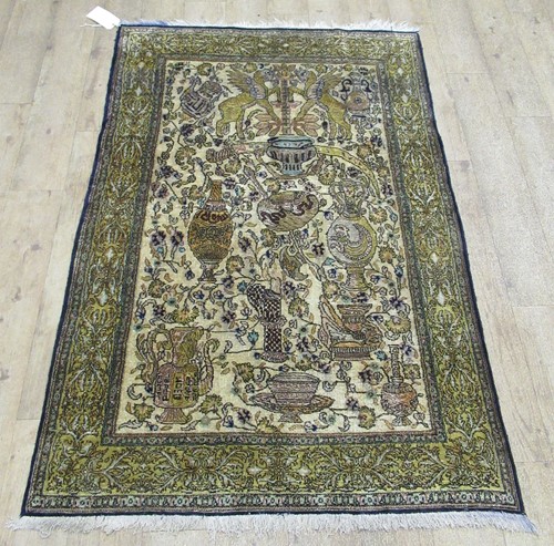 Lot 799 - A Persian yellow ground silk rug, 170 x 107cm