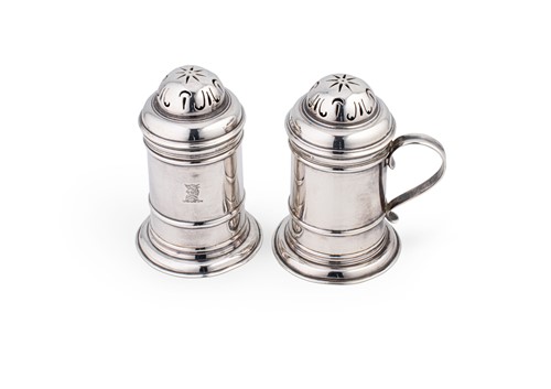 Lot 650 - A pair of George V Britannia silver casters, mark of Tessier Ltd.
