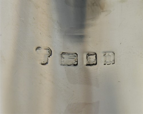 Lot 641 - A George V silver lighthouse style caster