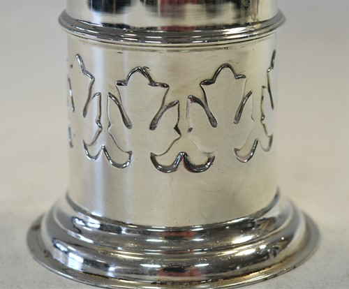 Lot 641 - A George V silver lighthouse style caster