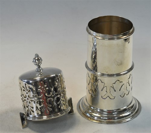 Lot 641 - A George V silver lighthouse style caster