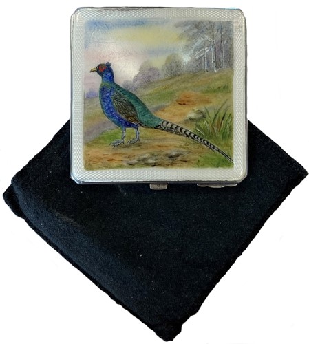 Lot 448 - A mid 20th century silver powder compact with enamelled scene