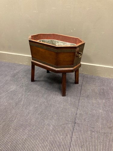 Lot 497 - George III brass bound mahogany cellarette, 49...