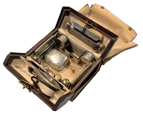 Lot 437 - An early 20th century gentleman's travelling grooming kit, mark of Asprey & Co.