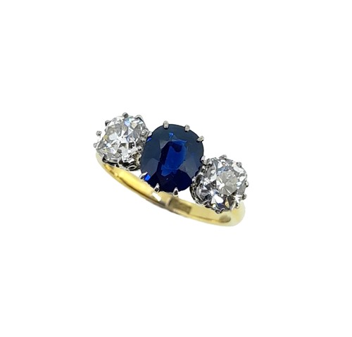 Lot 273 - A sapphire and diamond three stone ring