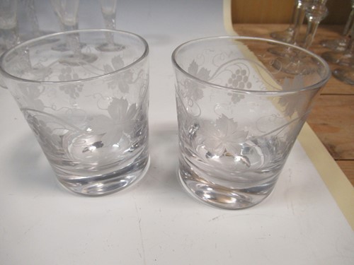 Lot 12 - A set of 29 air-twist drinking glasses, with...