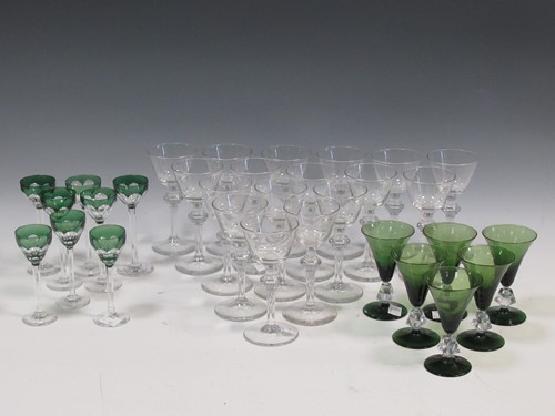 Lot 13 - A set of 17 wine glasses, 20th century, with...