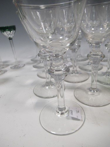 Lot 13 - A set of 17 wine glasses, 20th century, with...