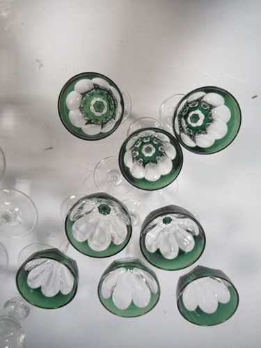 Lot 13 - A set of 17 wine glasses, 20th century, with...