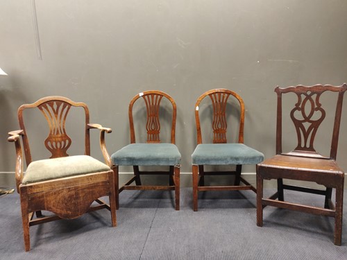 Lot 552 - A 19th century country made commode elbow...