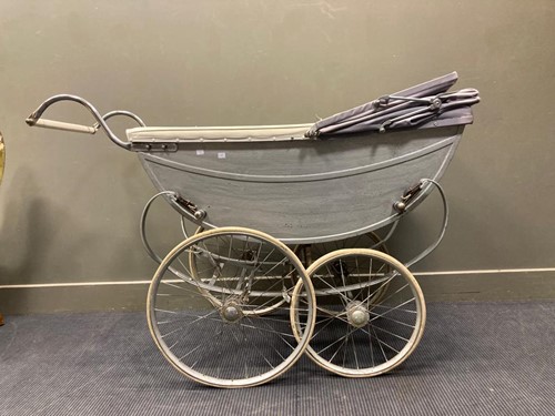 Lot 684 - A silver cross type pram