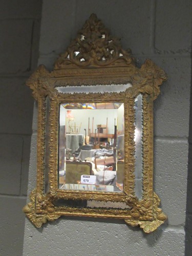 Lot 679 - A Dutch style gilt framed wall mirror with...