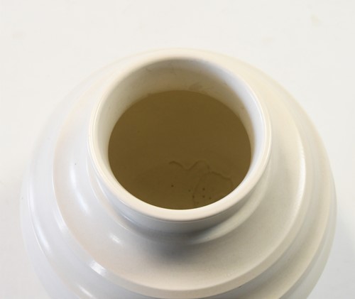Lot 52 - Keith Murray for Wedgwood, a Moonstone 'football' vase
