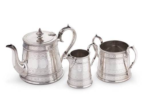 Lot 606 - A Victorian silver harlequin 3-piece tea set