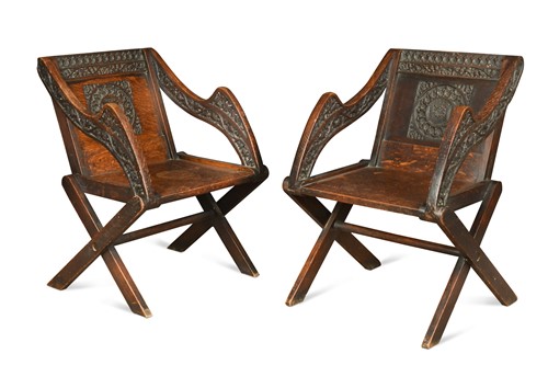 Lot 342 - A near pair of Glastonbury style oak armchairs, 19th century