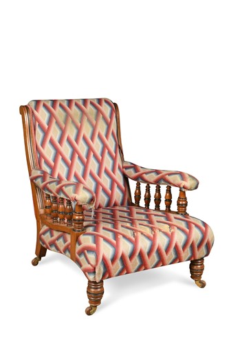 Lot 527 - A late Victorian walnut and ebonised open armchair
