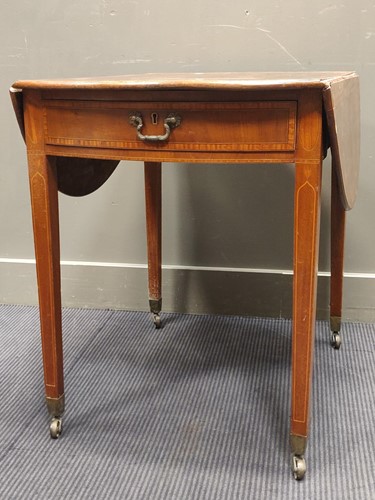 Lot 593 - A George III mahogany oval inlaid pembroke...