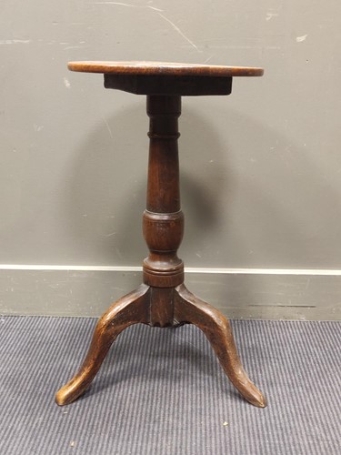 Lot 503 - A small 19th century oak tripod table with...
